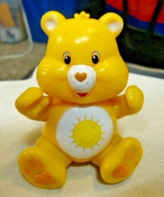 3.  5 " Tall Posable Yellow Sunshine Care Bear Plastic Pvc Figurine Carebear