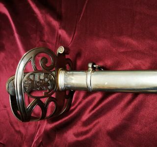 19th Century Cavalry Sword Likely British,  With Curved Blade And The Scabbard