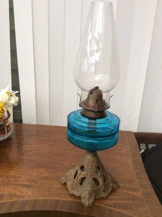 Vintage Oil Lamp With Cast Iron Base Blue Glass Font Queen Anne Burner