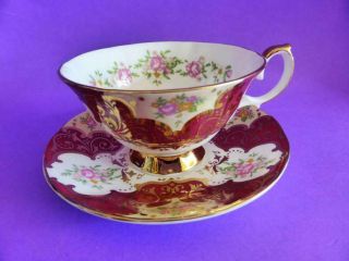 Elizabethan " Balmoral " English Bone China Red And Gold Teacup And Saucer,  1960s