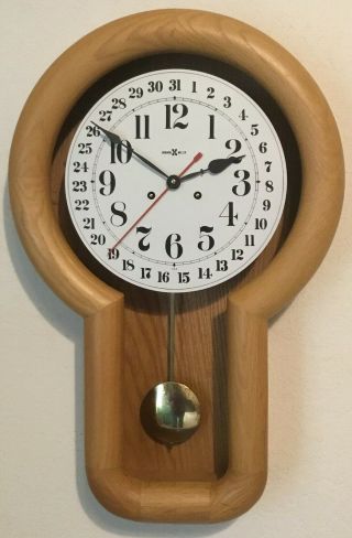 Howard Miller Oak Calendar Wall Clock Model 622238 - German Movement
