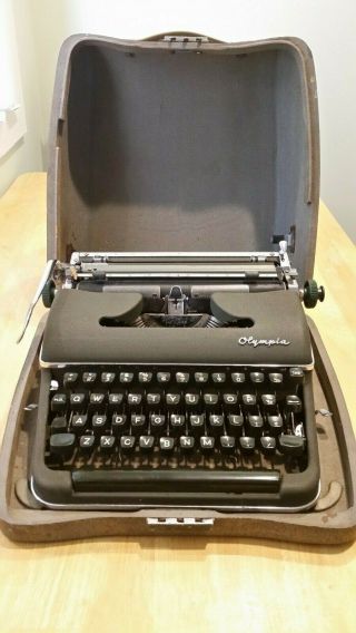 Vintage Olympia Typewriter & Case,  Portable.  Green W/ Black Keys Made In Germany