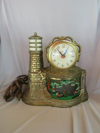 Vintage United Clock Corp Brass Tone Lighthouse Clock