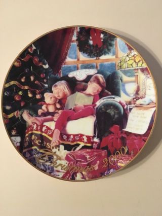 Avon 8” Christmas Plate.  Trimmed In 22k Gold.  2000