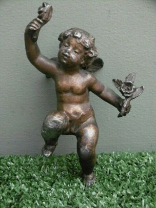 19thc Architectural Spelter Figure Of A Winged Cherub Holding Flowers