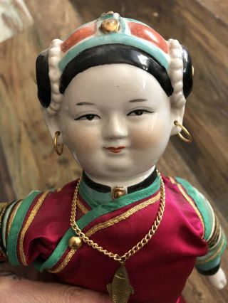 Chinese Doll With Porcelain Head,  Hands & Feet.  Body Is Stuffed.  13”