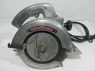 Vintage Porter Cable by Rockwell 7” Heavy Duty Model 115 Circular Saw.  w/ Case 2