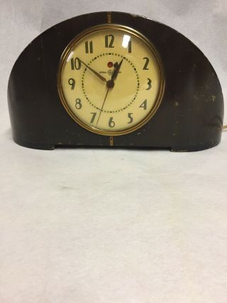 Vintage General Electric Mantel Clock Running And Keeps Good Time.  Wooden Base