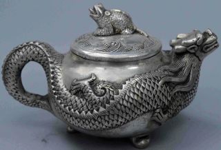 Collectable China Handwork Old Miao Silver Carve Dragon Exorcism Decor Tea Pot