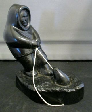 Vintage Carved Soapstone Inuit Eskimo Man Pulling Seal From Ice