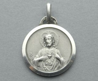 Jesus Christ,  Saint Virgin Mary.  Sacred Heart.  Antique Religious Silver Pendant.