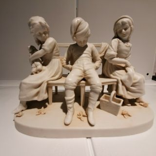 Goebel Hummel Figurine W/ Detailed Children Sitting On A Bench Porcelain