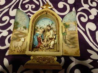 Religious Figure Of The Nativity With Joseph And Mary And Baby Jesus In The.