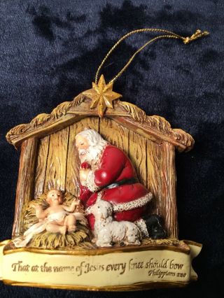 Kneeling Santa Baby Jesus Christmas Ornament By Roman Inc
