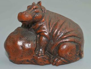 China Collectable Handwork Boxwood Carve Rhinoceros Hug Peach Exorcism Statue