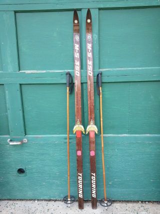 A Very Interesting Vintage Wooden 69 " Long Skis With Brown Finish And Poles