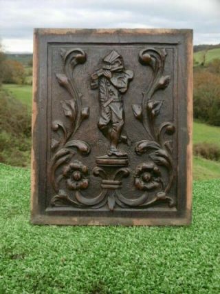 19thc WOODEN OAK CARVED PANEL WITH MUSICIAN FIGURE PLAYING PIPES C.  1860 2