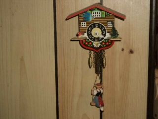 Vintage West Germany Small Cuckoo Clock With Lady On Swing