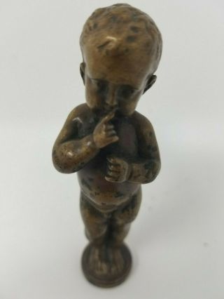 19th Century Bronze Desk Seal In The Form Of A Nude Cherub With Armoral Seals