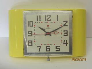 Vintage Telechron Electric Wall Clock,  Mid Century,  Yellow,  1950 