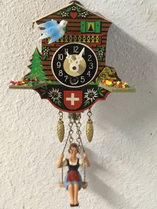Swiss Chalet Wind Up Clock With Girl On Swing,  Roof Missing