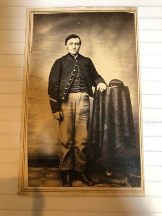 Civil War Era Cdv Of A Young Man Standing Next To A Table