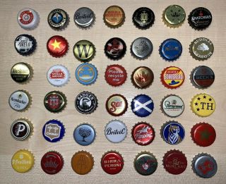42 X Beer & Bottle Crown Caps Tops.  42 X Designs.  Collectable Crafts.