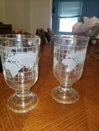 Set Of 2 Etched Globe World Nestle Footed Mugs