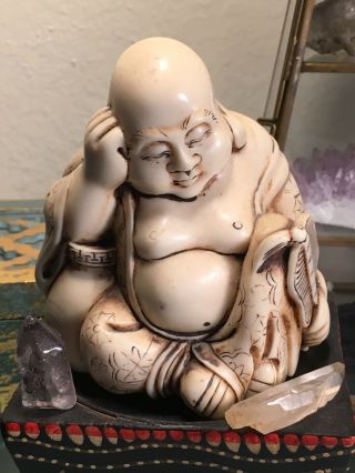 Resin Resting Buddha Statue With Handpainted Wood Stand And Quartz Crystal