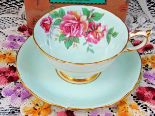 Paragon Pink Roses Vivid Blue Wide Mouth Tea Cup And Saucer