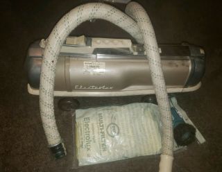Vintage Electrolux Canister Vacuum Model G Bronze,  2attachments & 4 Bags