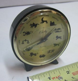 Vintage 1960s Bradley Wind - Up Zodiac Face Alarm Clock Black & Brass Color 85395