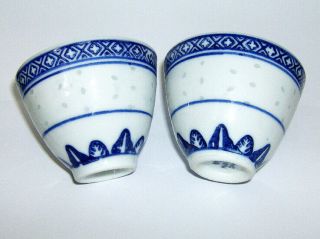 Two Rice Pattern Chinese Sip Cups) (with Dragon Design In Base Of Cups
