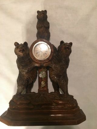Antique Black Forest carved wood bear clock with glass eyes 2