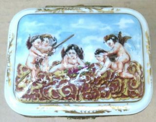 French Porcelain And Gilt Bronze Box Covered In Cherubs And Flowers