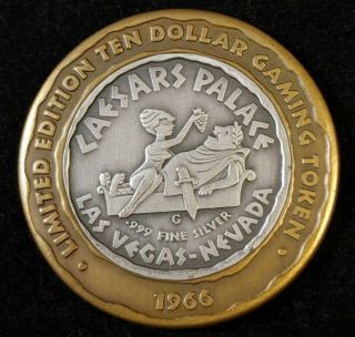 Caesars Palace - $10.  999 Silver Strike Casino Token - Antique Finish