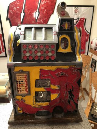Vintage Mills 5 Cent Red Lion Slot Machine.