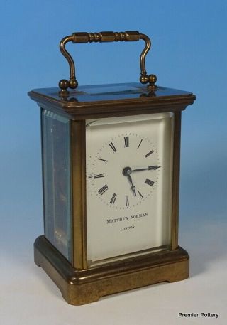 Swiss Made Matthew Norman London Gilt Brass Bevelled Glass Carriage Clock