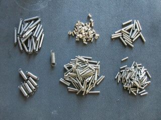 Misc Slot Machine Parts - Pins,  Springs And Rivets.
