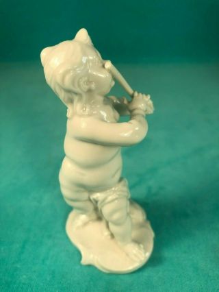 NYMPHENBURG GERMANY PORCELAIN FIGURINE OF A PUTTI CHILD WITH FLUTE,  NOT 3
