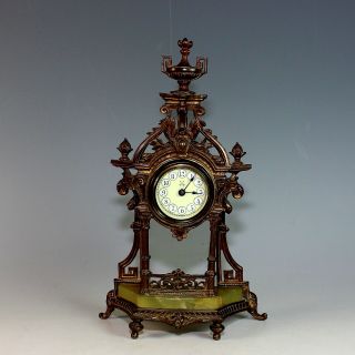 Antique German Mantle Clock With Porcelain Dial And Onyx Base