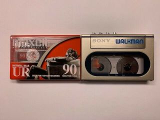 Vintage Sony Walkman WM10 comes with Belt Clip and strap plus Audio Cassette 2