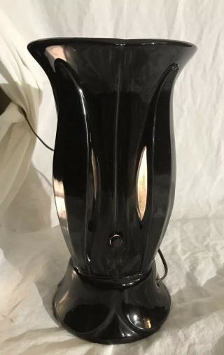 Vintage Mid Century Glossy Black Ceramic Lamp With Light Slits And Unique Bulb