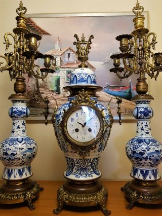 French Porcelain & Gilt Mantel Clock & 4 Arms CandelАbras Set.
