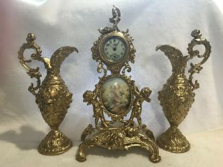 Antique Jennings Brothers Clock With Porcelain Plaque And Garniture.  Set Of 3.