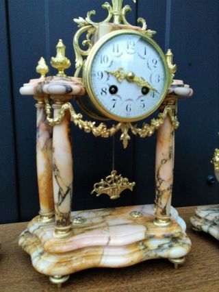 Antique French curved marble and bronze mantelclock,  Louis XVI style 2