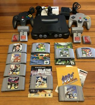 N64 Nintendo 64 Console,  2 Controllers,  Cords And 9 Vintage Games.