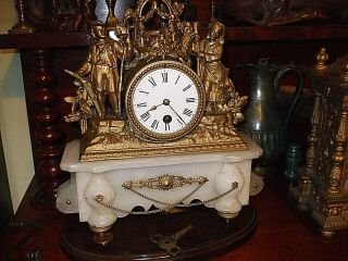 Antique French Gilt Metal And Alabaster 8 Day Clock.