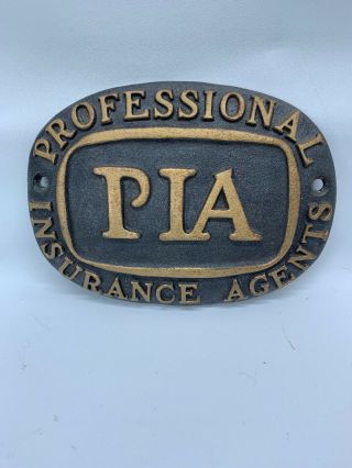 Pia Professional Insurance Agents Cast Iron Metal Wall Plaque