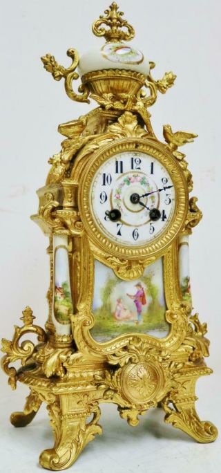 Antique French 8 Day Striking Gilt Metal & White Sevres Porcelain Mantel Clock